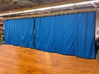 blue curtain pair wooden floor