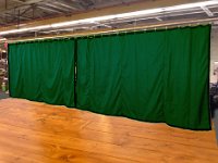 green curtain pair wooden floor